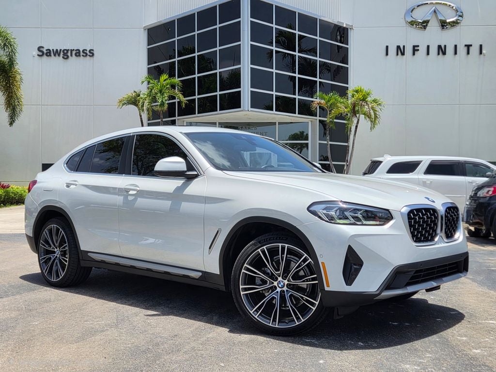 2025 BMW X4 xDrive30i in White Metallic — front three-quarter view
