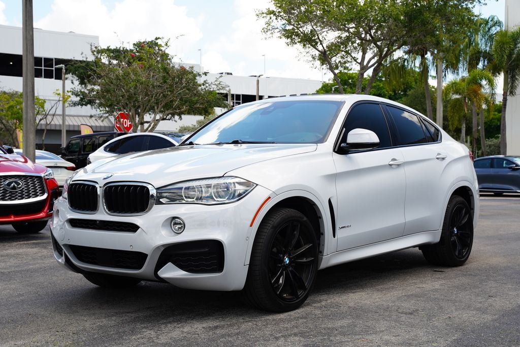 2018 BMW X6 — rear three-quarter view