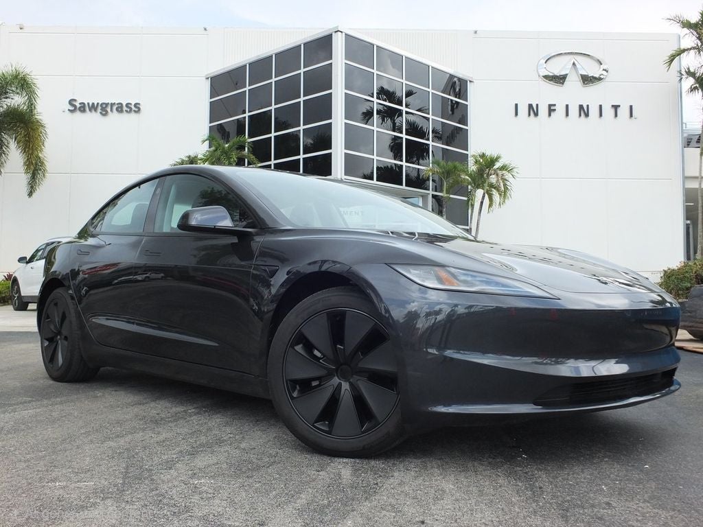2025 Tesla Model 3 Standard in Gray — front three-quarter view