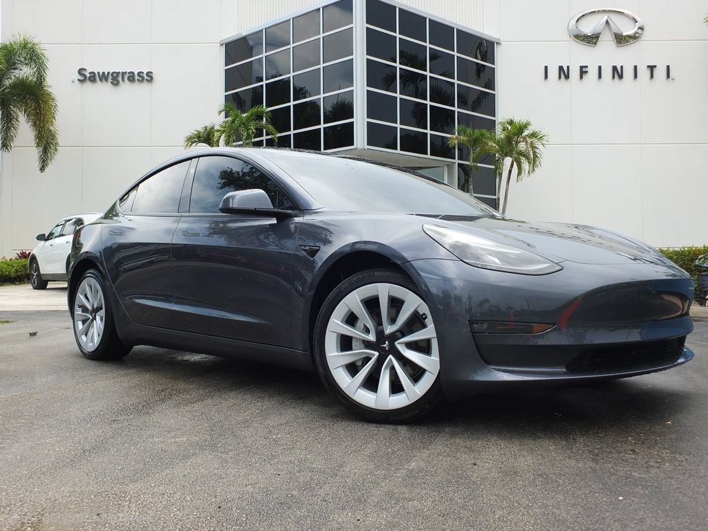 2023 Tesla Model 3 Long Range in Midnight Silver Metallic — front three-quarter view