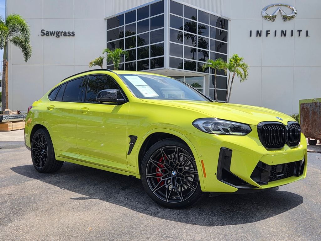 2022 BMW X4 M Base Competition in Sao Paulo Yellow — front three-quarter view