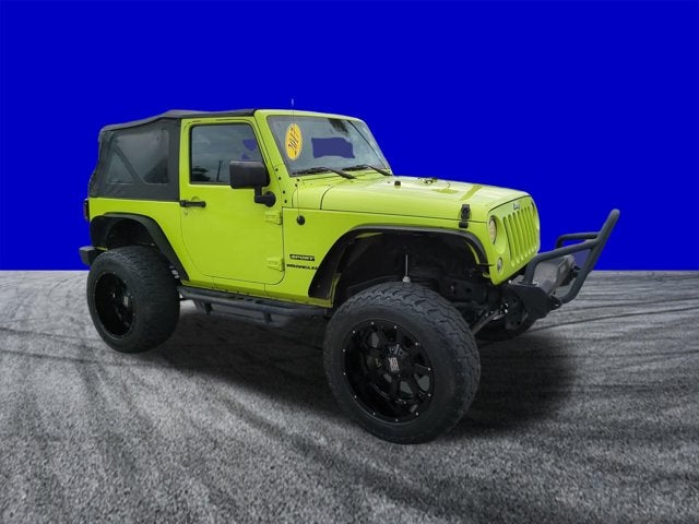 2017 Jeep Wrangler Sport in Hypergreen Clearcoat — front three-quarter view