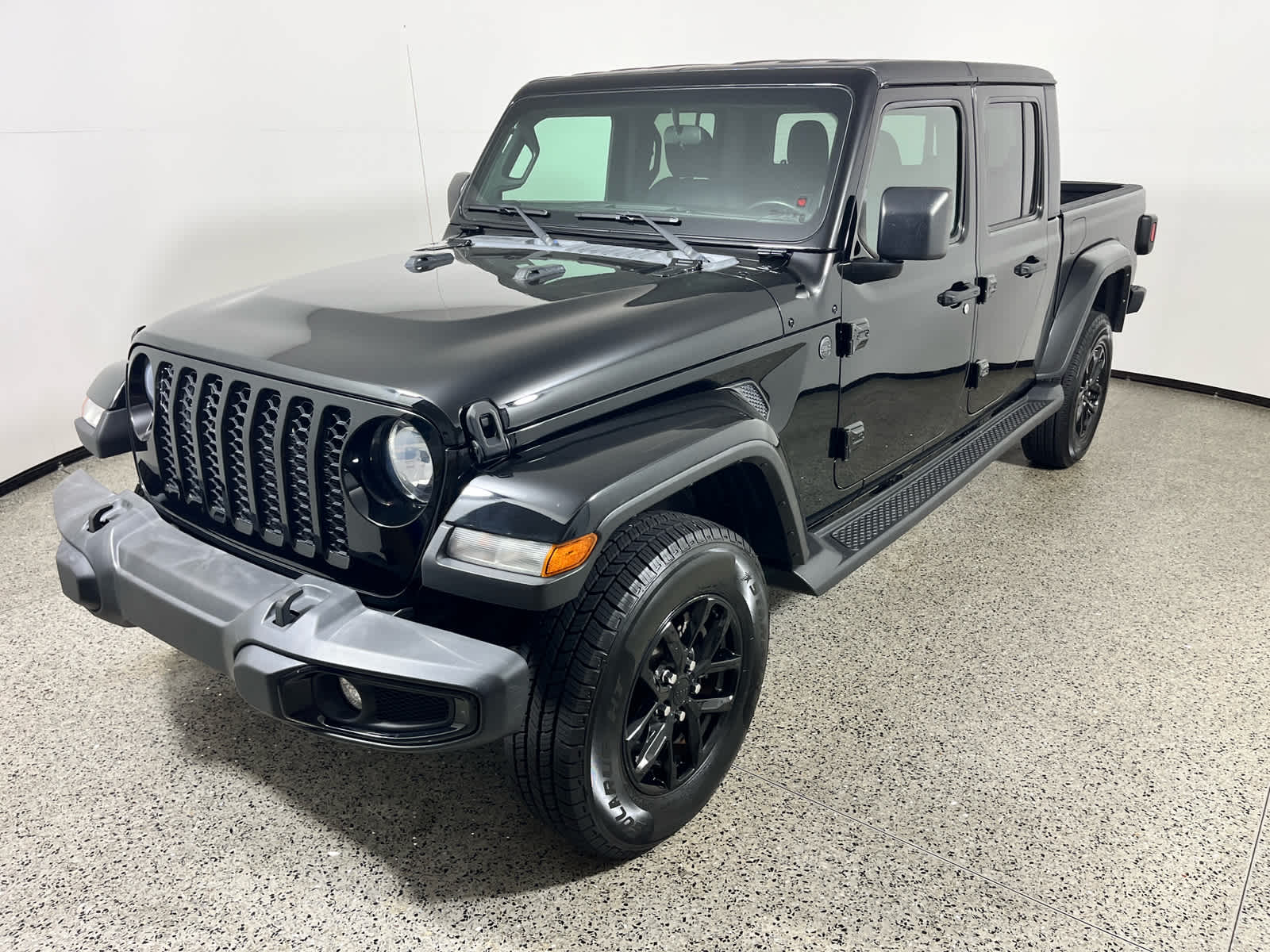 2022 Jeep Gladiator Altitude in Black Clearcoat — front three-quarter view