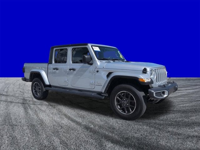2023 Jeep Gladiator Overland in Silver Zynith Clearcoat — front three-quarter view