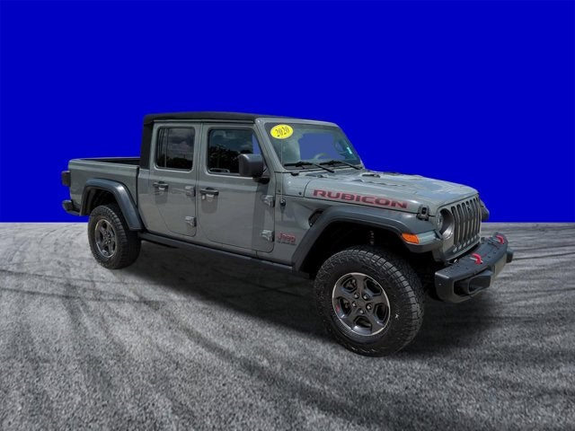 2020 Jeep Gladiator Rubicon in Sting-Gray Clearcoat — front three-quarter view