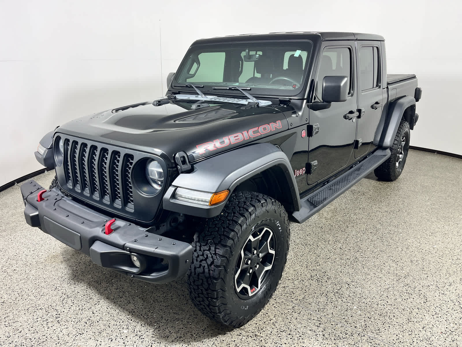 2022 Jeep Gladiator Rubicon in Black Clearcoat — front three-quarter view