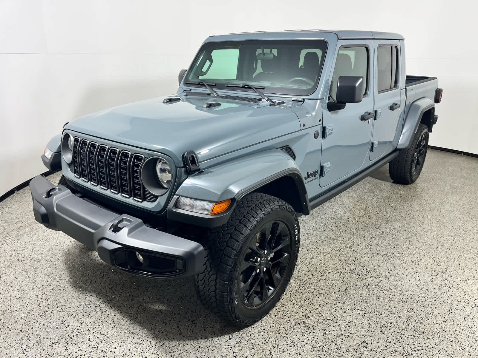 2025 Jeep Gladiator Nighthawk in Anvil Clearcoat — front three-quarter view