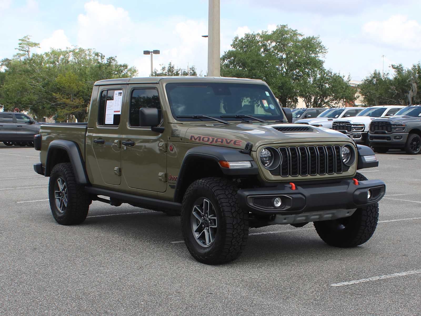 2025 Jeep Gladiator Mojave in 41 — front three-quarter view