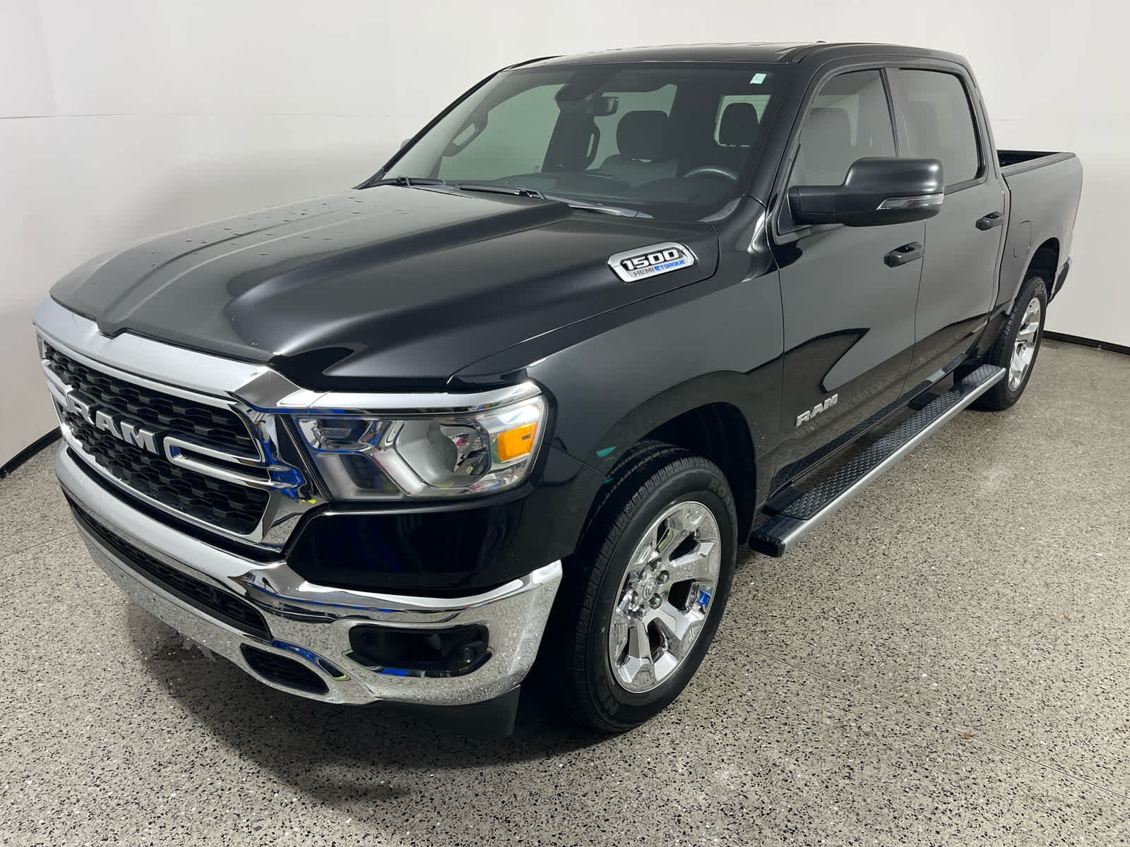 2024 RAM 1500 Big Horn in Diamond Black Crystal Pearlcoat — front three-quarter view