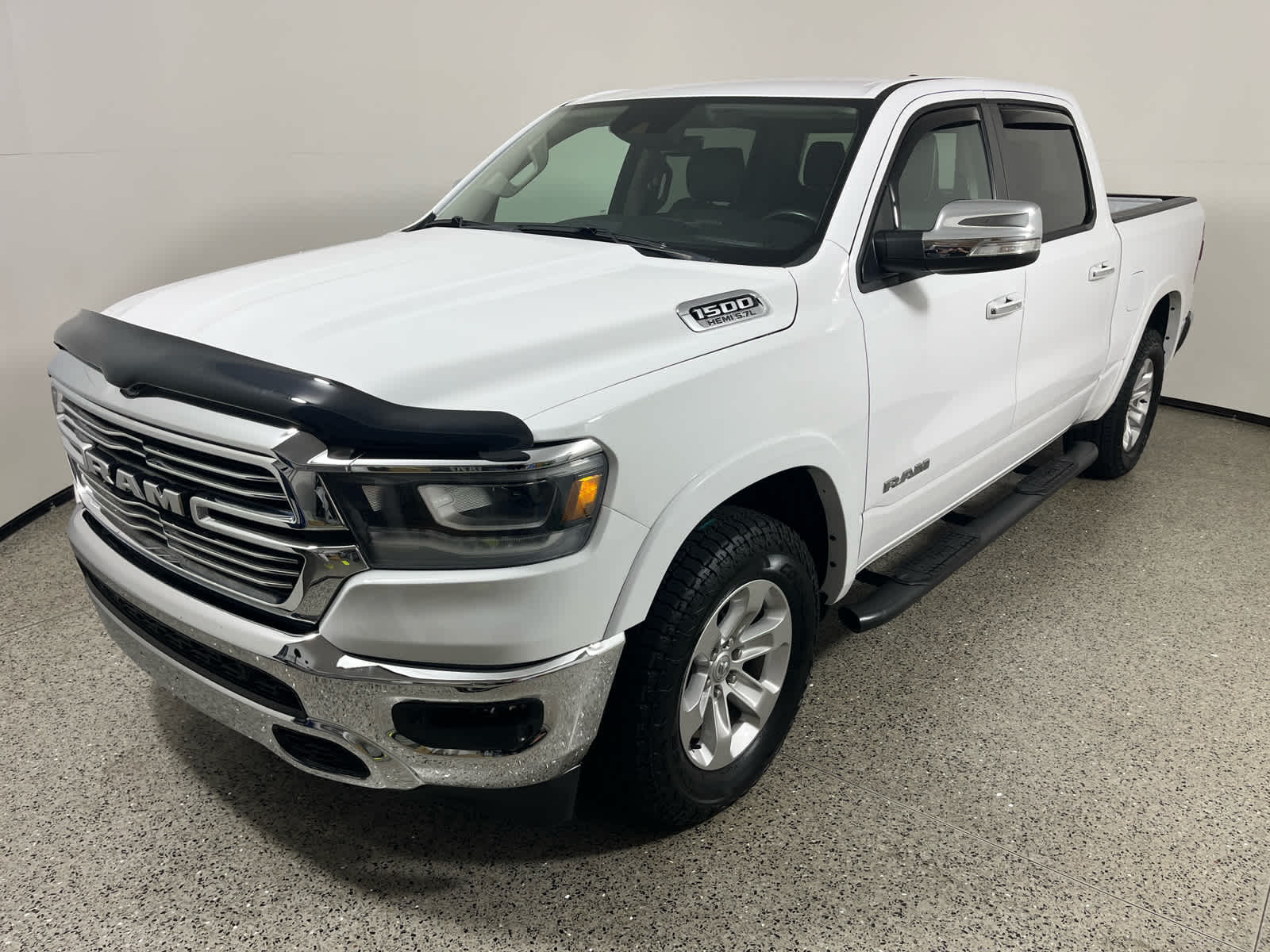 2022 RAM 1500 Laramie in Bright White Clearcoat — front three-quarter view