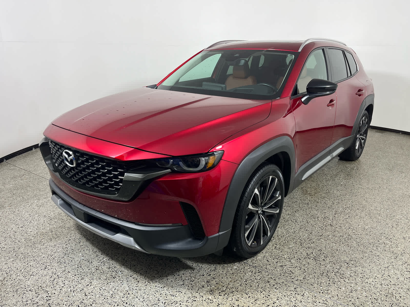 2024 Mazda Mazda CX-50 2.5 Turbo Premium Package in Soul Red Crystal Metallic — front three-quarter view