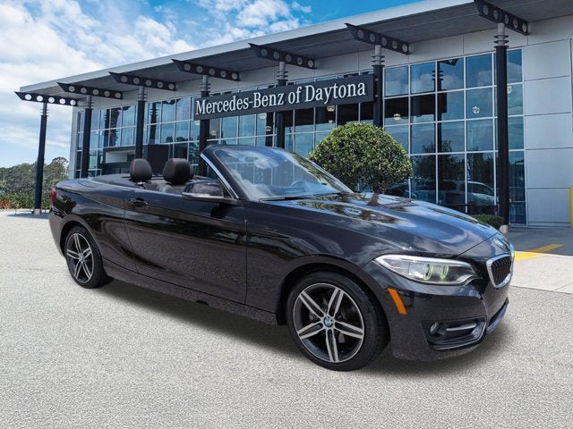 2017 BMW 2 Series 230i xDrive in Black Sapphire Metallic — front three-quarter view