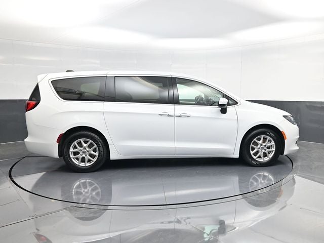 2023 Chrysler Voyager LX in Bright White Clearcoat — front three-quarter view