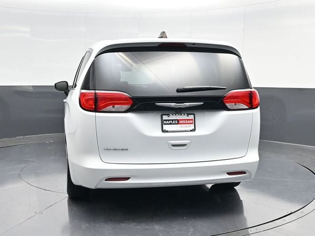 2023 Chrysler Voyager — rear three-quarter view