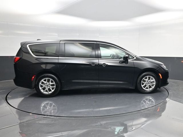 2023 Chrysler Voyager LX in Brilliant Black Crystal Pearlcoat — front three-quarter view