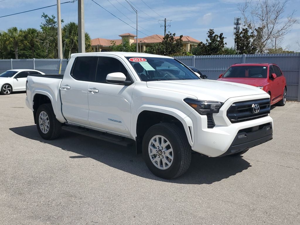 2024 Toyota Tacoma SR5 in Ice Cap — front three-quarter view
