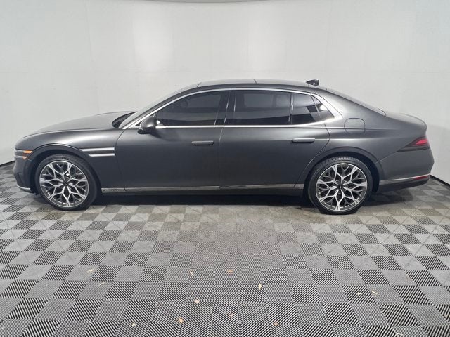 2023 Genesis G90 e-SC in Makalu Gray Matte — front three-quarter view