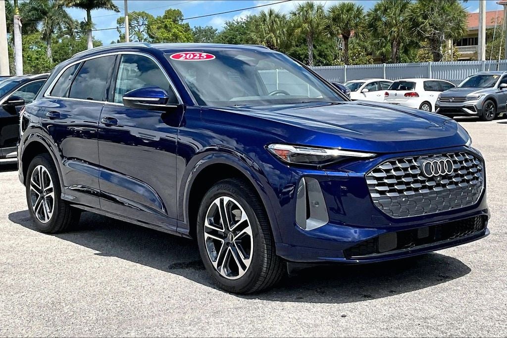 2025 Audi Q5 2.0T Premium Plus quattro in Navarra Blue Metallic — front three-quarter view