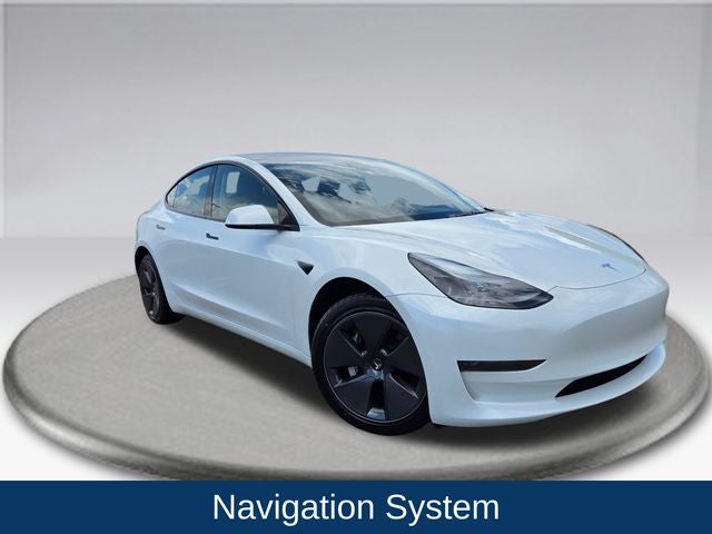 2023 Tesla Model 3 Base in White — front three-quarter view