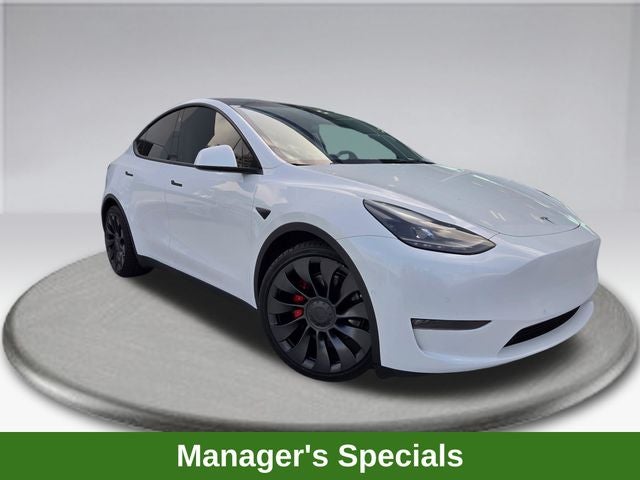2022 Tesla Model Y Performance in White — front three-quarter view