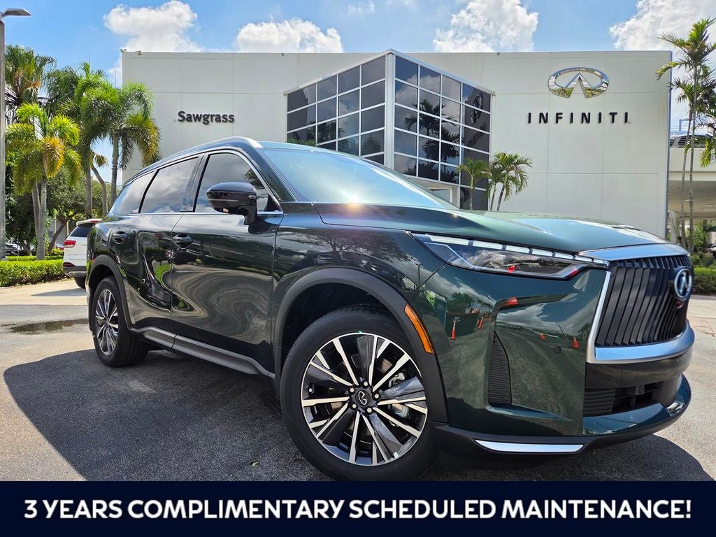 2027 INFINITI QX60 LUXE in Deep Emerald — front three-quarter view