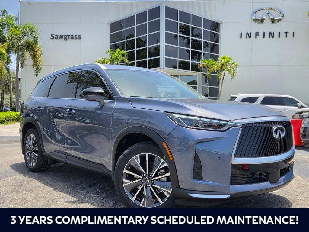 2027 INFINITI QX60 LUXE in Blue — front three-quarter view